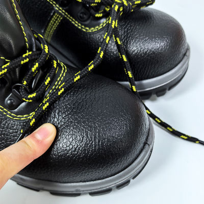 Calzature da lavoro di sicurezza di ferro nero anti-sfaccettatura anti-piercing